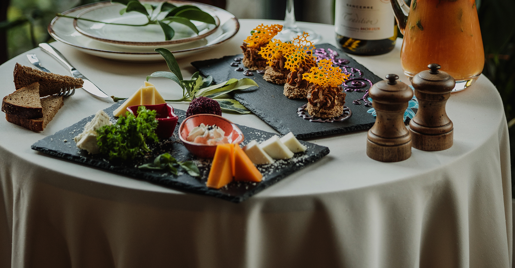 side-view-table-with-cheese-plate-pate-it 1